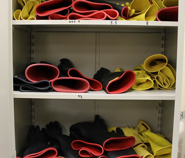 Sets of rubber gloves line the shelves at OPPD's Elkhorn Service Center