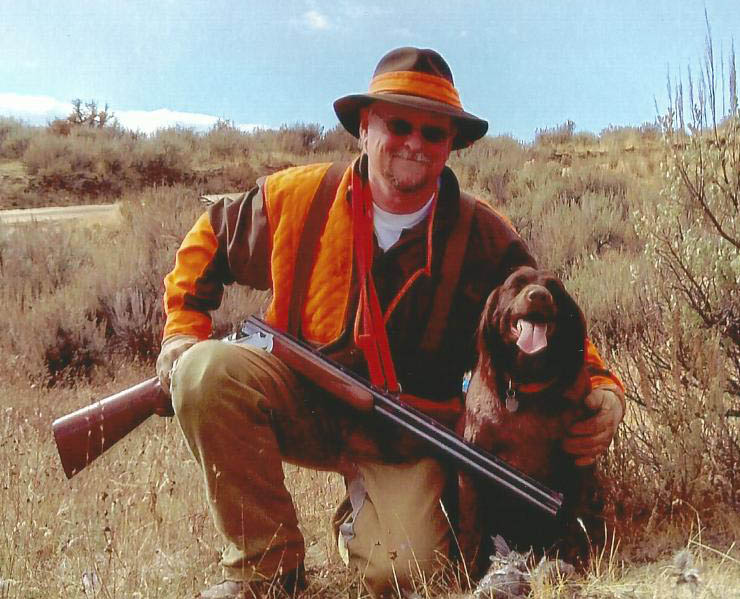 Chris Vrtiska with his hunting dog, Yasha, during a trip to Idaho.