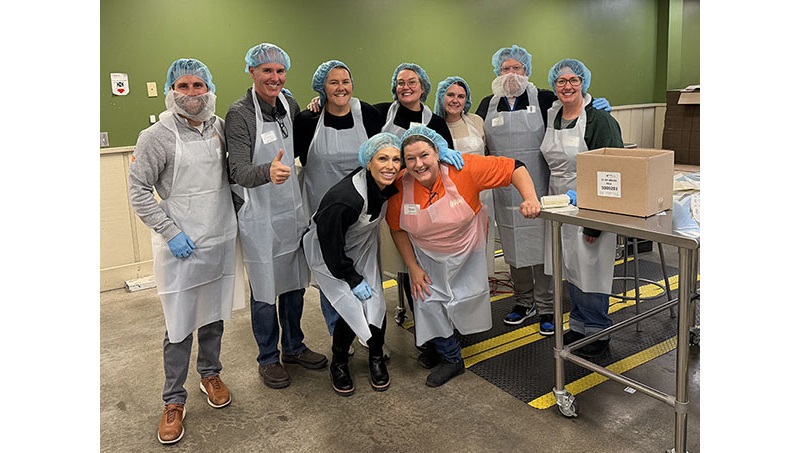 OPPD employees volunteer at Food Bank for the Heartland. Employees spend time giving back at the food bank each year.