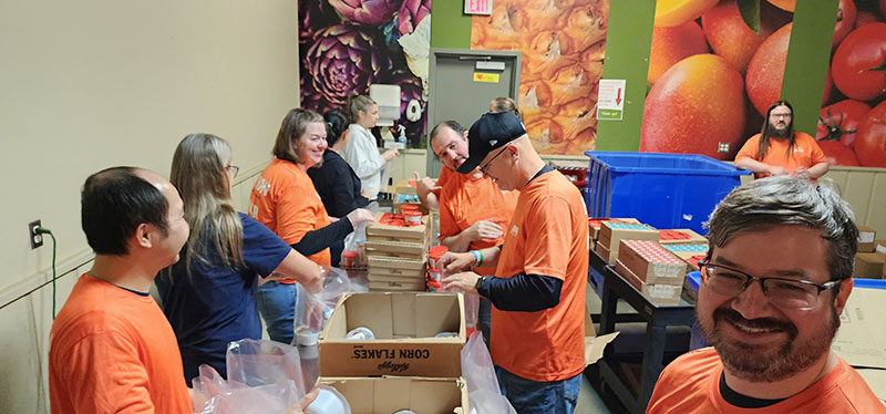 OPPD employees volunteer at Food Bank for the Heartland, as part of a long tradition of giving back to communities in the utility's service area.