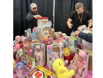 OPPD employees sort through toys at Heartland Hope Mission.