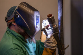 Eric Devney takes part in a skills assessment for steamfitter mechanic candidates at OPPD's Nebraska City Station.