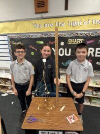 The Pringle.com team shows off the tower that won Most Creative.