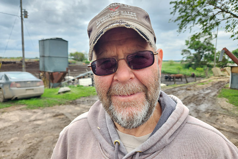 Cliff Schwartz stands on his farm in York County. He would like to lease some of his land for use in a proposed OPPD solar project.