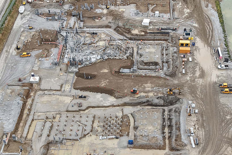 Crews are preparing the grounds of Cass County Station for expansion.